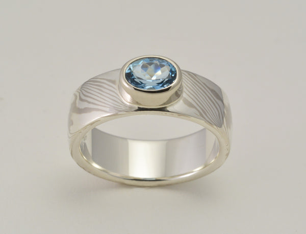 Custom: Palladium White Gold and Sterling Silver Mokume Gane with Oval Aquamarine