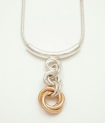 Embrace 2 Tone Long Pendant