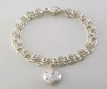 Heaven and Earth 2 Tone Charm Bracelet